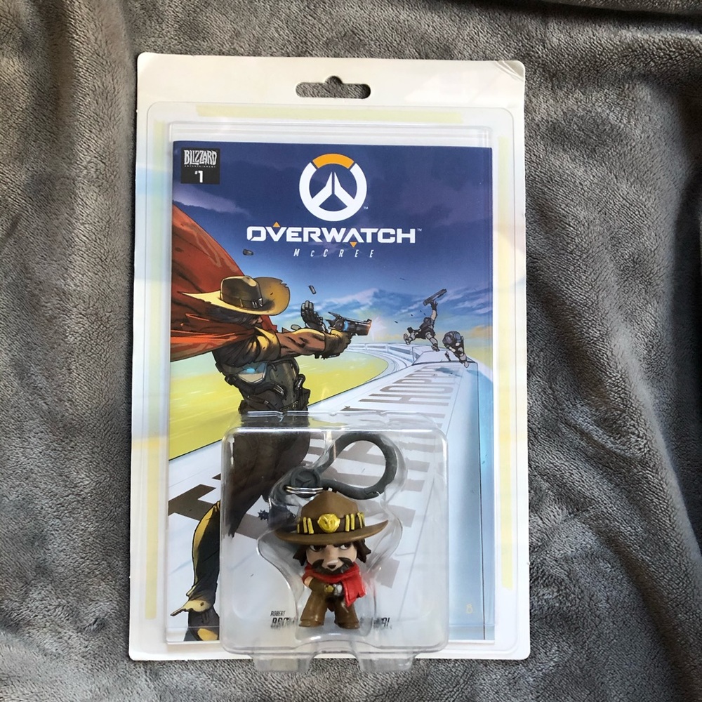 Overwatch McCree Keychain and comic book